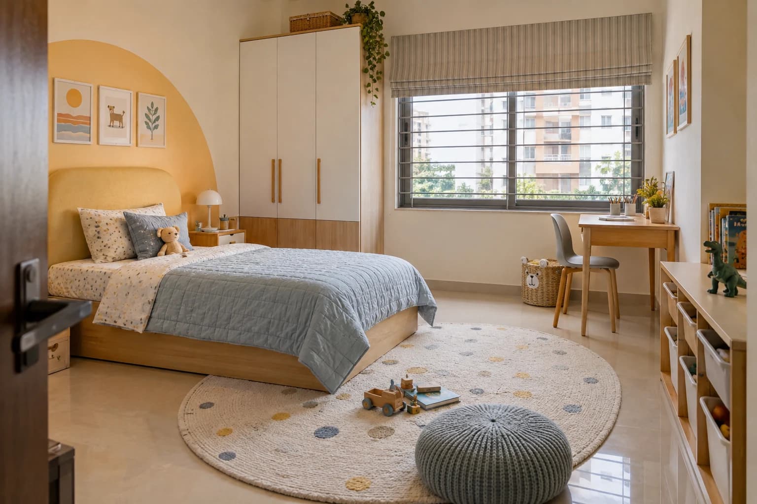 Butter-yellow headboard, pale blue bedding and a compact study area in an Indian apartment kids’ room