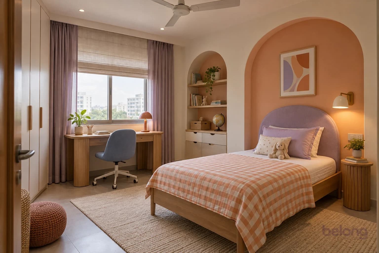 Child’s bedroom with an apricot painted arched recess framing an oak single bed with a lavender rounded headboard, beside an arched niche with oak shelves holding books, a globe and a plant