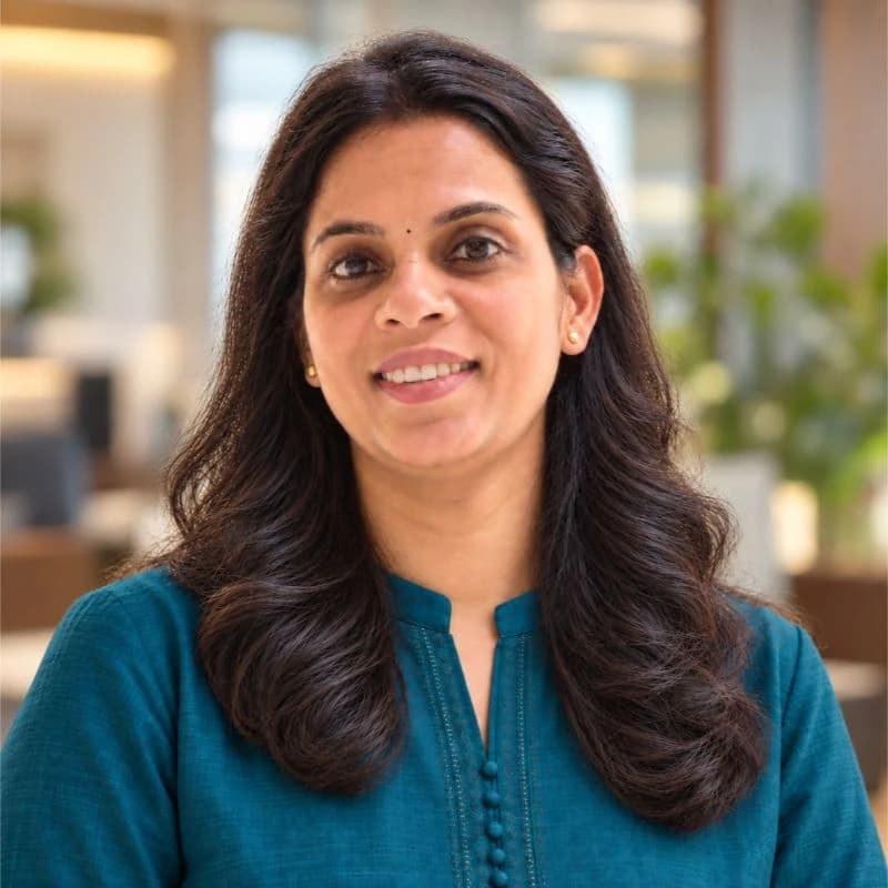 Athira Narayanan, CEO of Belong, smiling in a teal kurta