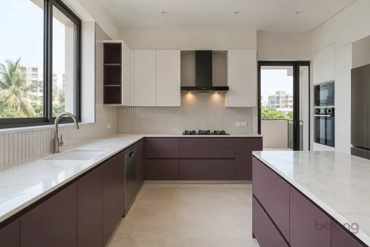 New modern white sink and brushed nickel tap in aubergine and porcelain white, with white fine-veined porcelain worktops and white vertical stacked tiles.